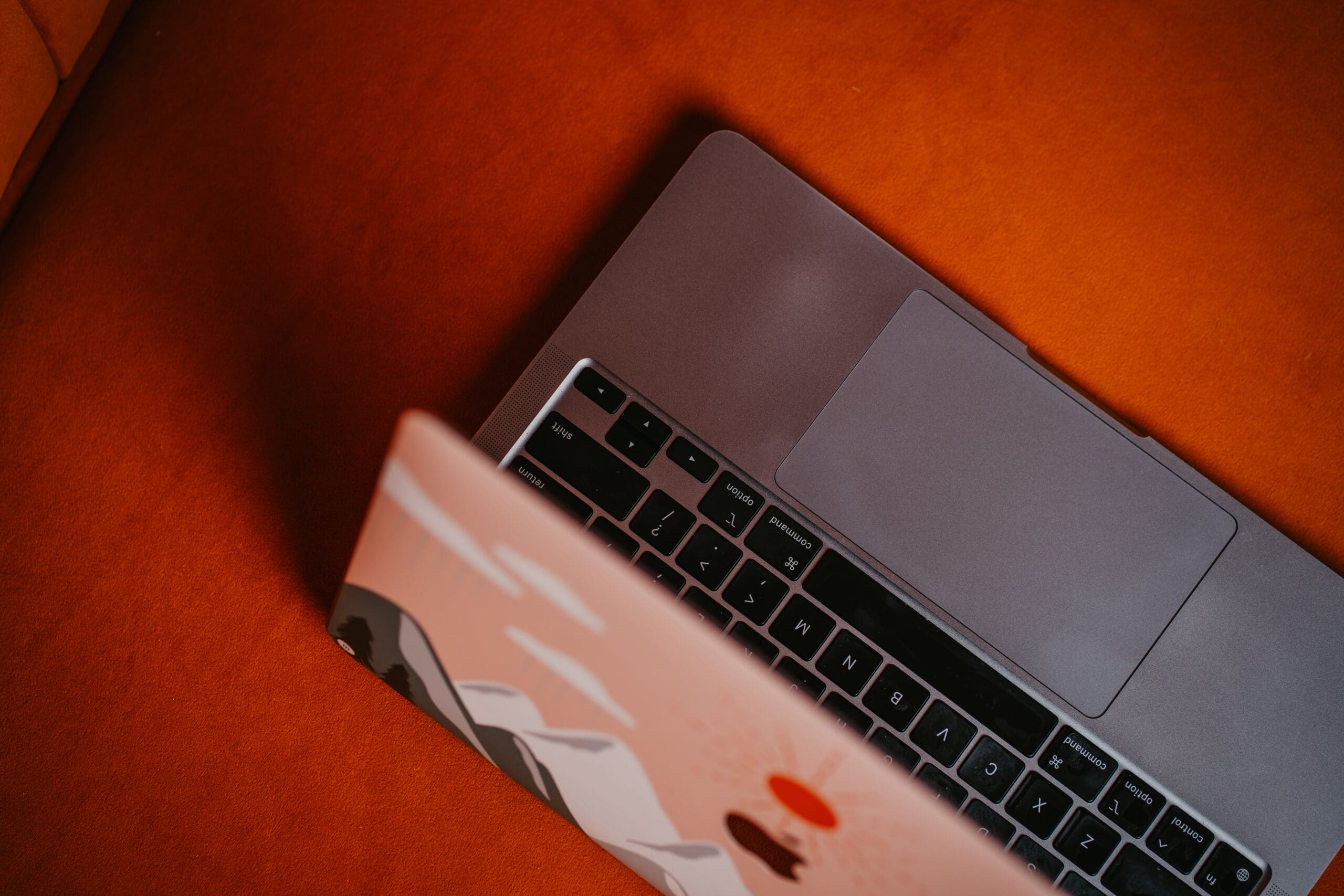 drive more traffic to website, computer open sitting on an orange couch